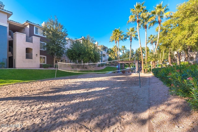 view of property's community featuring volleyball court