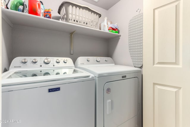 laundry area with washer and clothes dryer