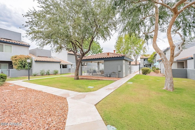 view of community featuring a lawn