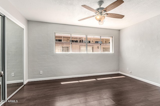 725 S Power Rd Unit 101, Mesa, AZ 85206 - unfurnished room featuring a ceiling fan, wood finished floors, a textured ceiling, and a textured wall