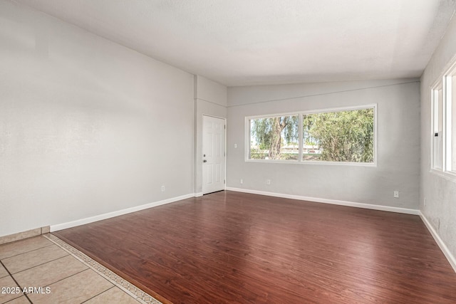 725 S Power Rd Unit 101, Mesa, AZ 85206 - spare room with dark wood-style flooring