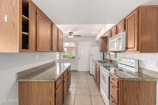 725 S Power Rd Unit 101, Mesa, AZ 85206 - kitchen featuring white appliances, a ceiling fan, light tile patterned floors, brown cabinetry, and recessed lighting