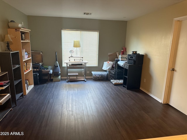 1206 W Pinkley Ave, Coolidge, AZ 85128 - office with dark wood-type flooring, visible vents, and baseboards
