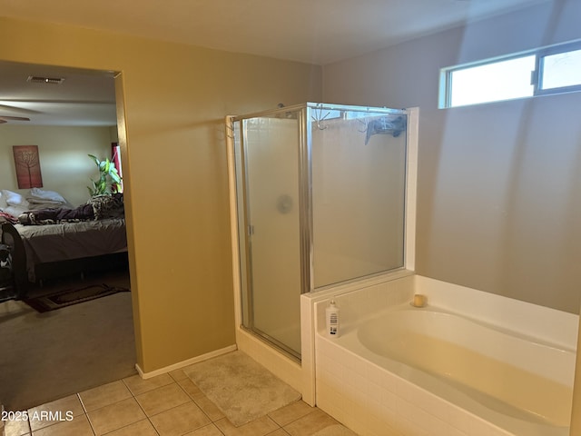 1206 W Pinkley Ave, Coolidge, AZ 85128 - full bath featuring a stall shower, tile patterned flooring, ensuite bath, a ceiling fan, and a bath