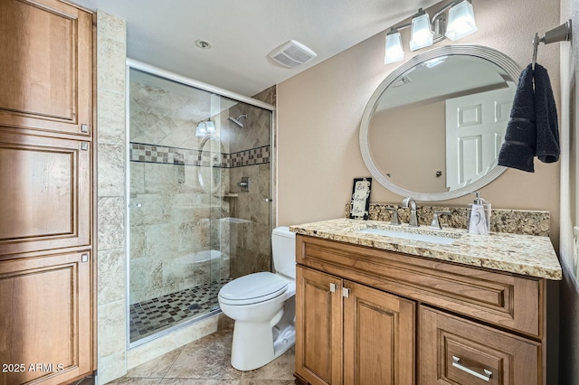 bathroom with walk in shower, vanity, and toilet