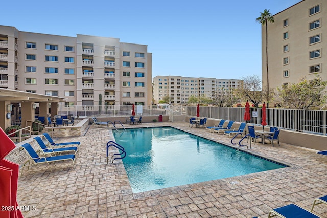 view of swimming pool featuring a patio