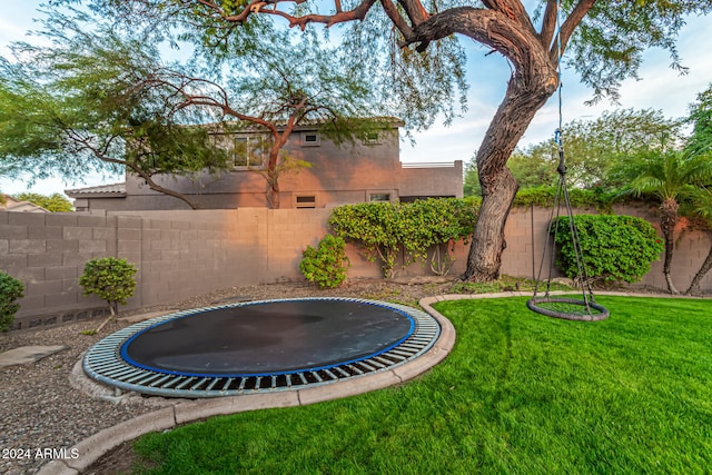 view of yard featuring a trampoline