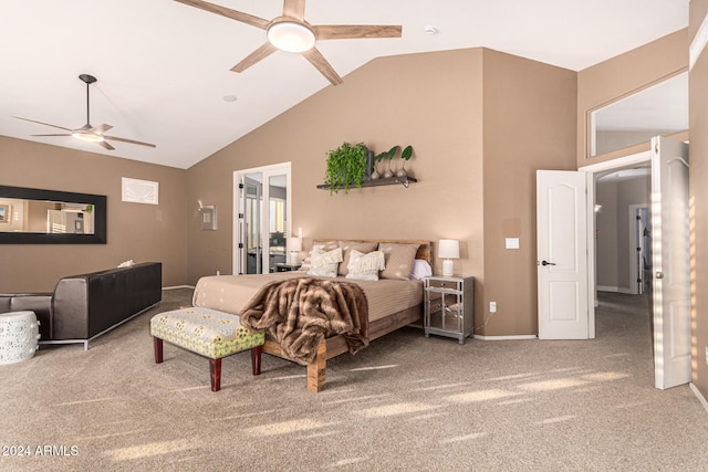 bedroom with ceiling fan, lofted ceiling, and carpet flooring