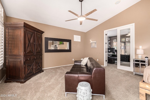 living room with ceiling fan, vaulted ceiling, french doors, and carpet flooring