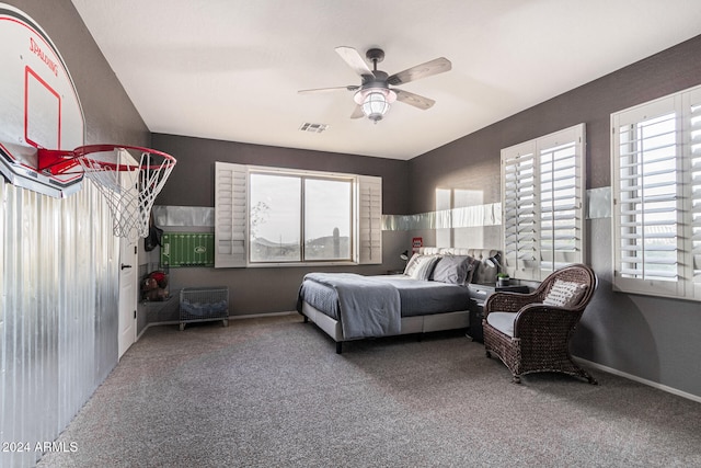 bedroom with ceiling fan and carpet floors