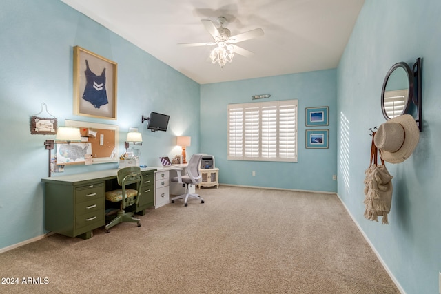 carpeted home office with ceiling fan