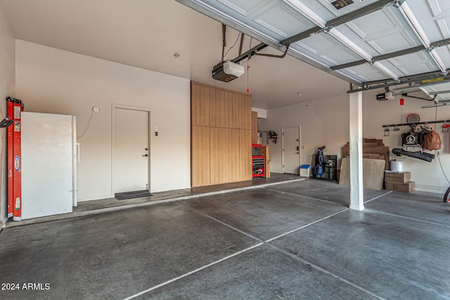 garage featuring a garage door opener