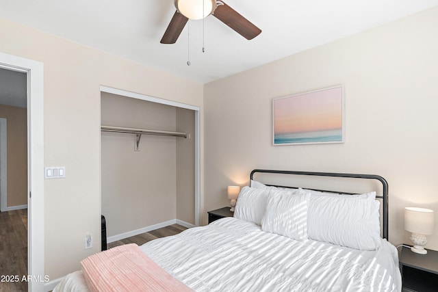 bedroom featuring ceiling fan, wood-type flooring, and a closet