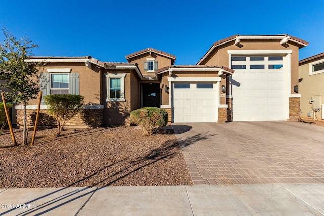 view of front of home with a garage