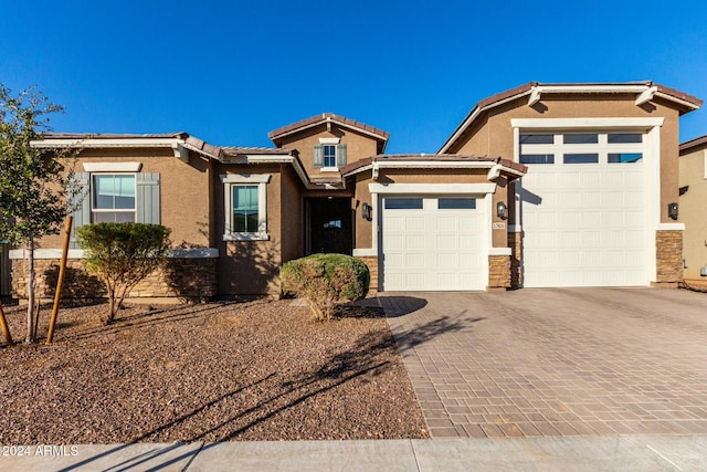 view of front of property featuring a garage