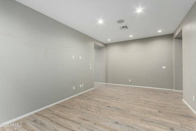 unfurnished room featuring light hardwood / wood-style flooring