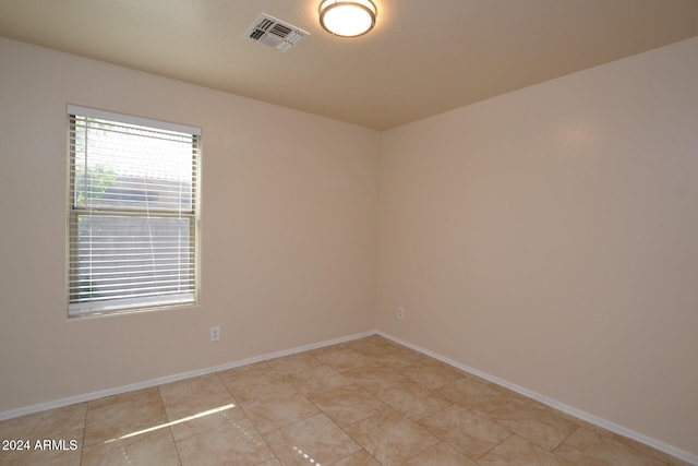 view of tiled spare room