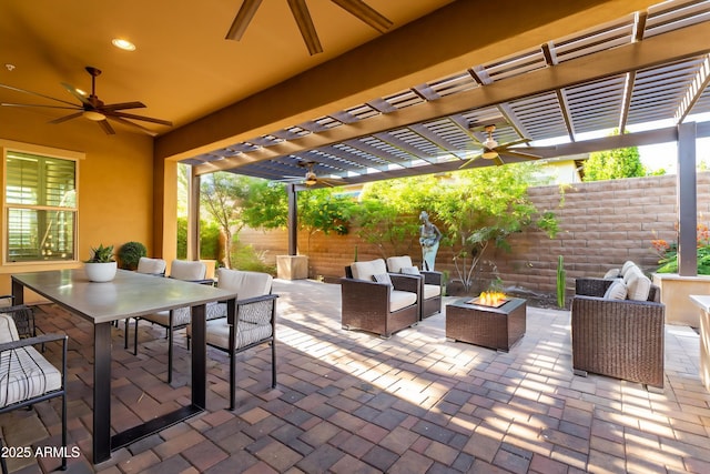 13448 W Miner Trl, Peoria, AZ 85383 - view of patio / terrace with ceiling fan, an outdoor living space with a fire pit, a pergola, and outdoor dining area