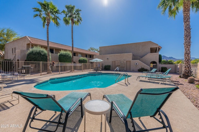 12635 N La Montana Dr Unit 17, Fountain Hills, AZ 85268 - community pool featuring a patio area and a mountain view