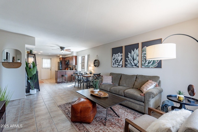 12635 N La Montana Dr Unit 17, Fountain Hills, AZ 85268 - living area with light tile patterned flooring and a ceiling fan