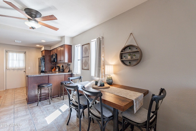 12635 N La Montana Dr Unit 17, Fountain Hills, AZ 85268 - dining space featuring ceiling fan and light tile patterned floors