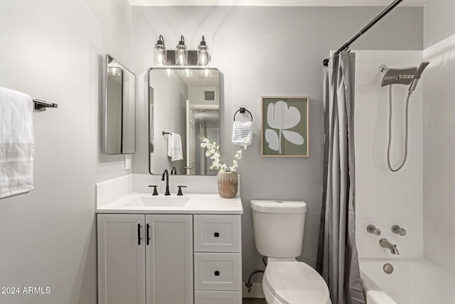 full bathroom featuring vanity, toilet, and shower / bath combo with shower curtain