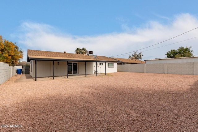 rear view of house with a patio