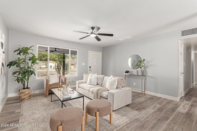 living room with light hardwood / wood-style floors