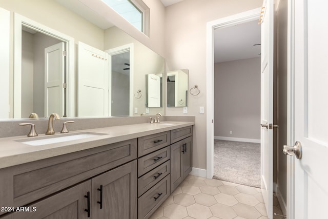 bathroom featuring tile patterned floors and vanity