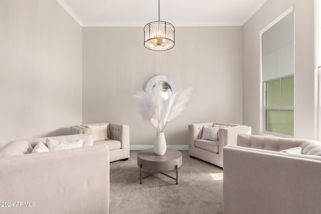 carpeted living room featuring a chandelier and ornamental molding