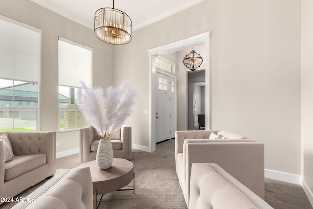 interior space with crown molding and an inviting chandelier