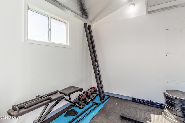 exercise area with lofted ceiling