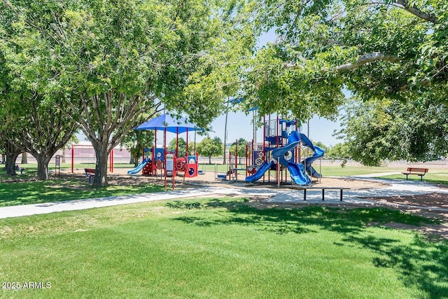 view of jungle gym with a lawn