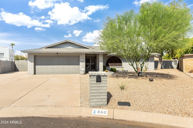 view of front of property with a garage