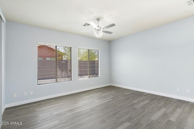 unfurnished room featuring wood-type flooring and ceiling fan