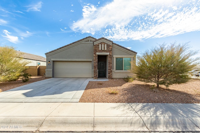 view of front of home with a garage