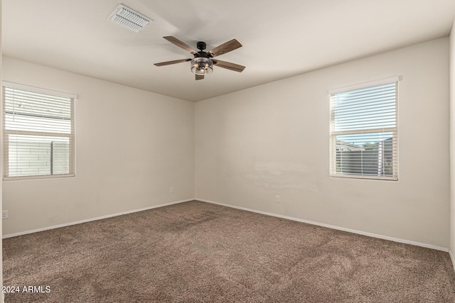 carpeted empty room with ceiling fan