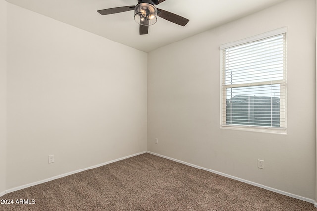 carpeted empty room with ceiling fan