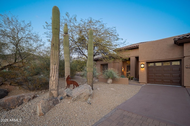 view of front of property featuring a garage