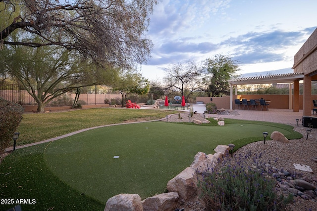 view of yard with a pergola and a patio