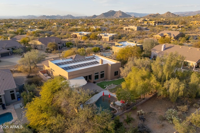 drone / aerial view featuring a mountain view