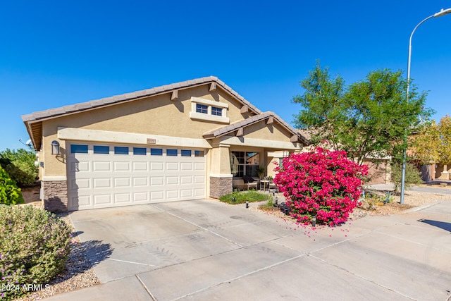 view of front of home with a garage