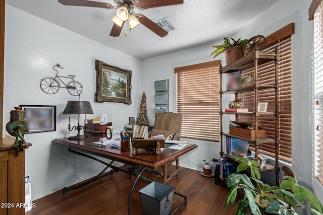 office area with ceiling fan and dark hardwood / wood-style floors