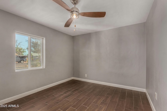 3402 W Tonto St W, Phoenix, AZ 85009 - empty room featuring dark wood-style floors and ceiling fan