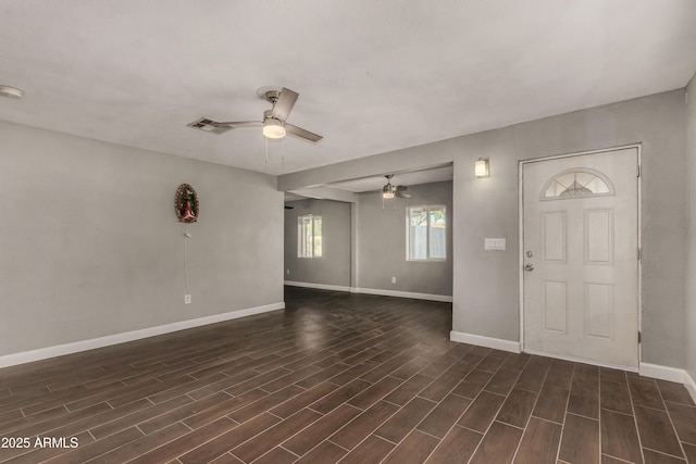 3402 W Tonto St W, Phoenix, AZ 85009 - entryway featuring a ceiling fan and dark wood finished floors