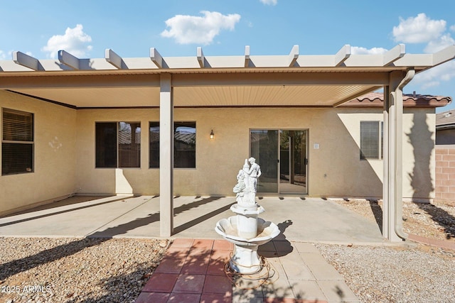 back of house featuring a patio