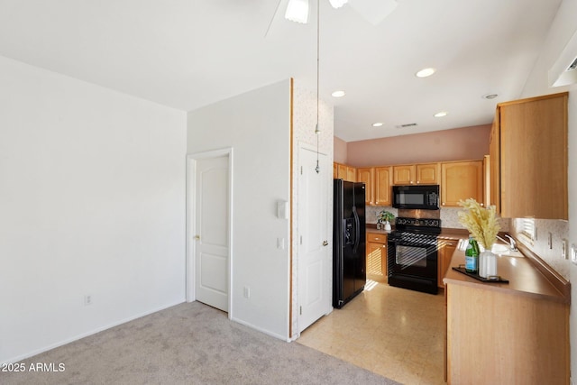 kitchen with light carpet, light brown cabinetry, ceiling fan, and black appliances