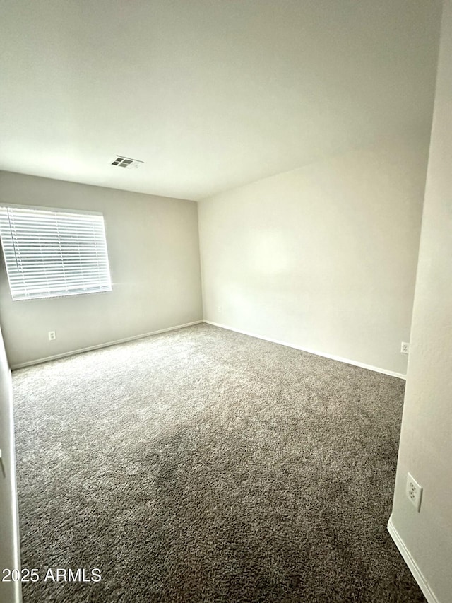 23284 W Pima St, Buckeye, AZ 85326 - carpeted spare room featuring baseboards