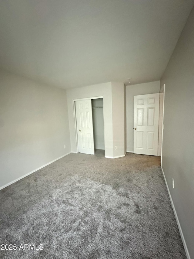 23284 W Pima St, Buckeye, AZ 85326 - unfurnished bedroom featuring carpet floors and a closet
