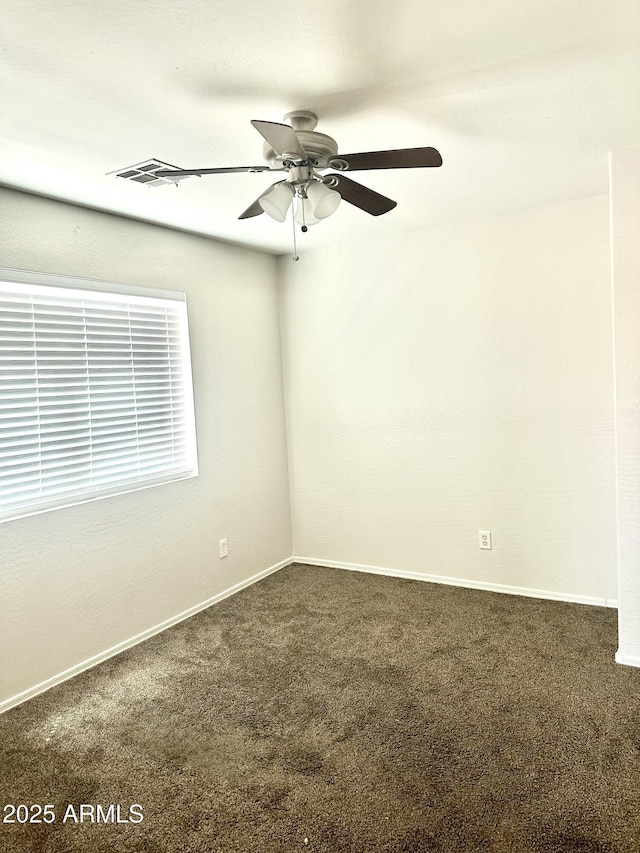23284 W Pima St, Buckeye, AZ 85326 - spare room featuring carpet floors and a ceiling fan